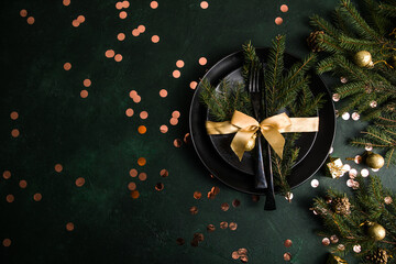 Table setting for celebration Christmas and New Year Holidays on  table. Festive place setting for...