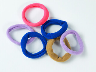 colorful hair band pink, blue,purple and brown on white background