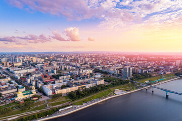 Fototapeta premium Aerial top view panorama city Perm and Kama river Russia, sunset drone photo