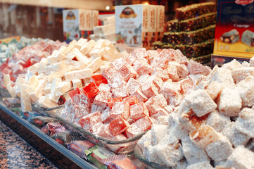Close up traditional turkish rahat lokum sweets candy in shop