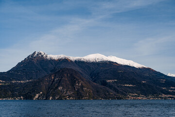 Snow on the tops of the mountains near Lake Como. Italy
