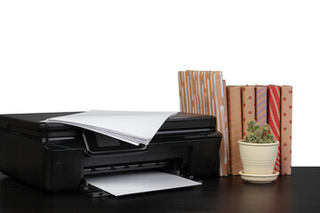 Office table with laser printer and books against white background