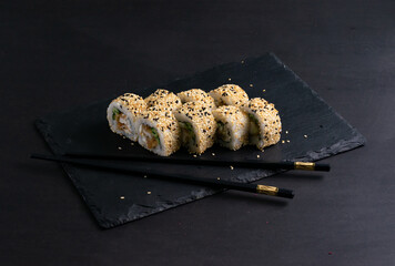 Sushi roll sushi with prawn, avocado, cream cheese, sesame. Sushi menu. Japanese food.