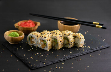 Sushi roll sushi with prawn, avocado, cream cheese, sesame. Sushi menu. Japanese food.