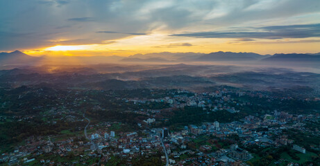 View from above, stunning aerial view of the city of Frosinone illuminated by a beautiful sunrise.  Frosinone is a town and comune in Lazio, Italy.