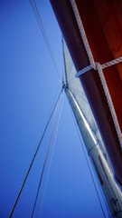 rigging and boom against sky