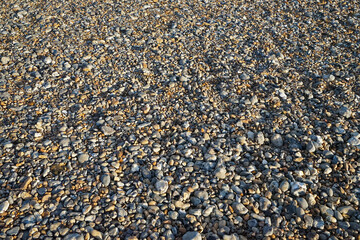 Natural sea stone pebble and texture sand