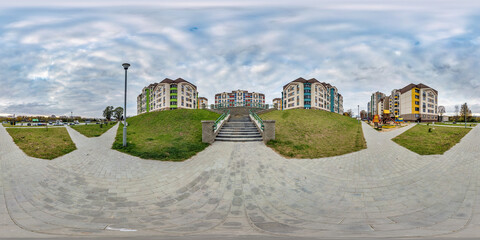 360 hdri panorama near playground in middle of modern multi-storey multi-apartment residential...