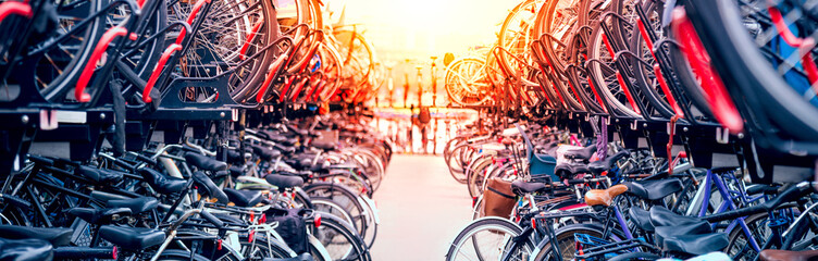 Public city bike parking. Eco-friendly transport for a healthy life. Bicycle parking in Amsterdam,...