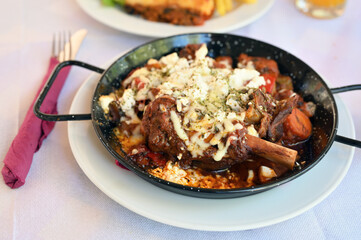 Braised lamb in gravy served with vegetables at the restaurant