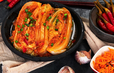 Kimchi cabbage on gray background.