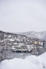 Petropavlovsk Kamchatsky city in the winter at snowy weather. Kamchatka peninsula, Russia