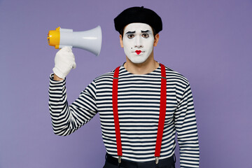 Charismatic serious businesslike frowning young mime man with white face mask wears striped shirt...