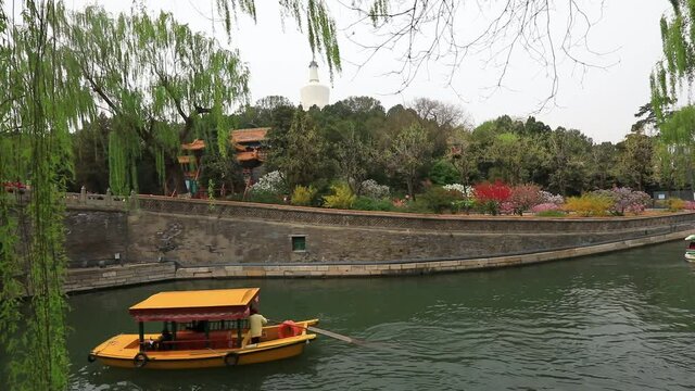 Cruise ships travel in Beihai Park, Beijing