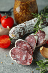 Сoncept of tasty food with salami sausage, close up