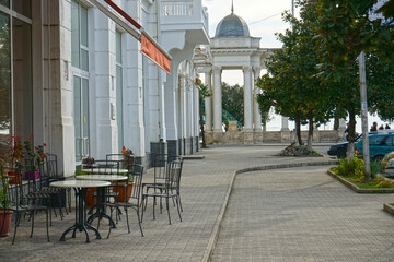 Fototapeta na wymiar Urban landscape with a view of the street near the embankment. Sukhumi,