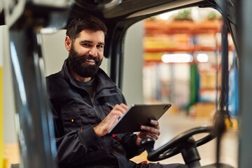 Joyful adult man, learning how to drive the machine.