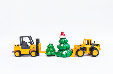 Christmas season concept, two truck with two Christmas tree toy on white background