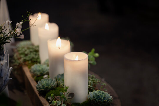 Decoration with plants and lit candles