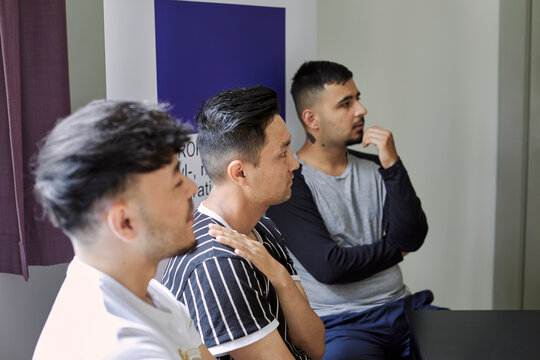 Young men having workshop in job center