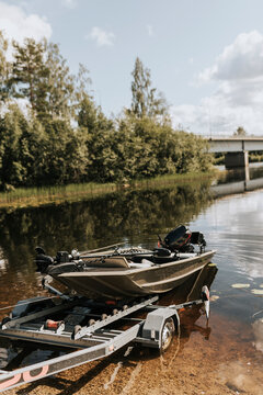 Boat on trailer at water