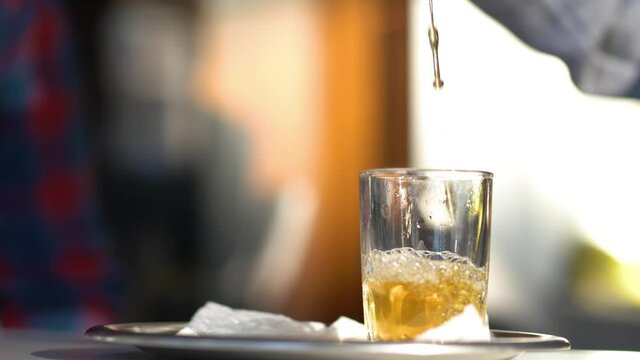 Enjoying the local custom of mint tea at a cafe in the Medina section of Marrakech, Morocco.