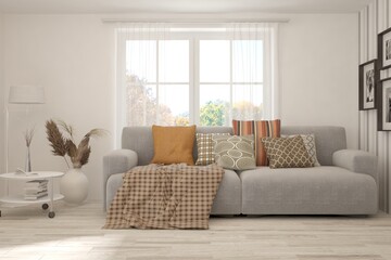 Stylish room in white color with sofa and autumn landscape in window. Scandinavian interior design. 3D illustration