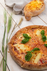 Traditional Georgian bread khachapuri on the table Homemade baking