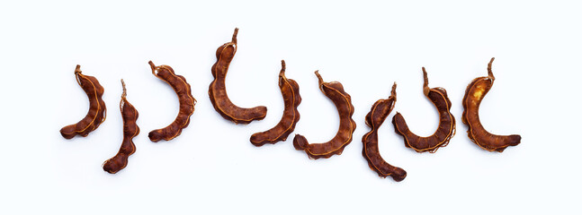 Tamarind tropical fruits on white background.