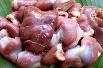 Mixed chicken entrails in banana leaf