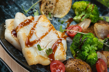 grilled squid with grilled vegetables and broccoli