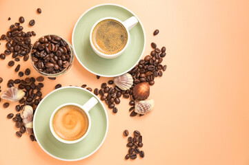 Coffee chocolate. Espresso with froth or macchiato in small cups, sprinkled coffee beans and chocolates. view from above. High quality photo. Copy space