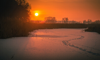 Winter sunrise on river