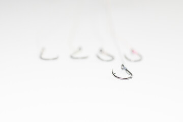 A sharp-edged hook lands against the underside hook that blurry