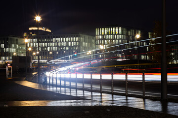 Fototapeta na wymiar A long exposure of a street in Berlin at night