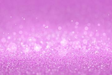 Violet abstract defocused bokeh background. Festive sparkling texture