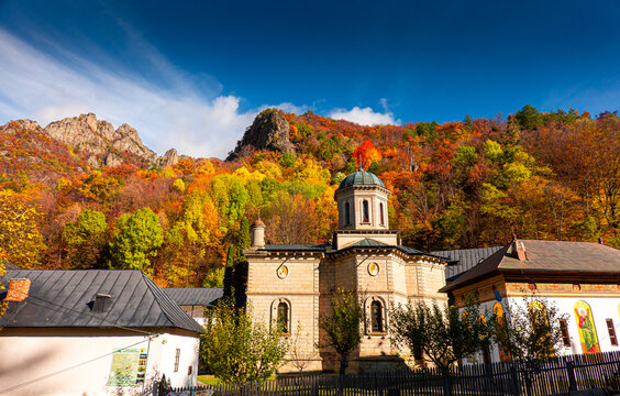 Stanisoara Monastery, built in the 18th century, is a orthodox religious landmark from Cozia Mountains and Romania. Photo taken in the autumn landscape.