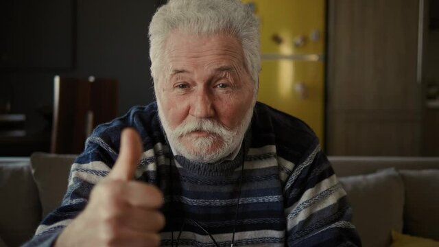 Happy old man show thumbs up look at camera. Portrait Thumbs up!