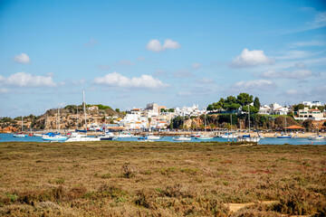 Coastal landscape with boats in Alvor, Algarve, Portugal