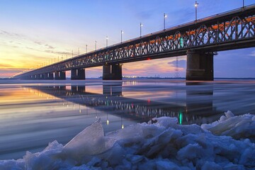 Ice floating on the Amur river. Motion blur. Khabarovsk, Amur bridge, Trans Siberian railway. Far...