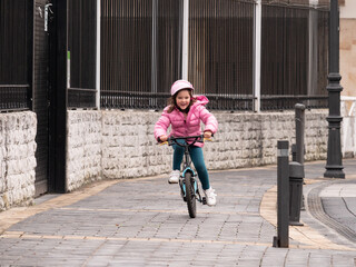 happy child riding a bicycle