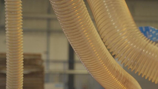 Close up of flexible duct for industrial extractor working. Close up