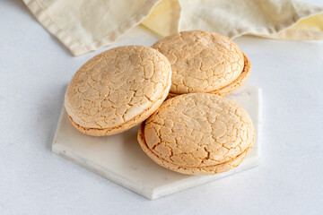 Acıbadem macaroon on a white background. Traditional Turkish cuisine flavor. delicious cookies. Local name acıbadem kurabiyesi