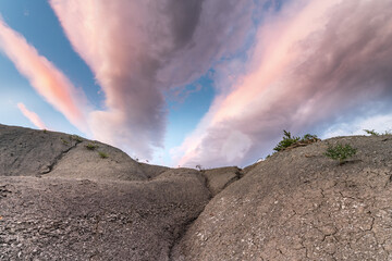 Colorful clouds above a landscape of Provence in the Drome.