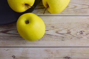 Zenith view , yellow apples on old woods. Copy space.