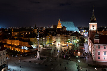 Fototapeta premium Warsaw old town view point. Panoramic view of Castle square at night. Warsaw, Poland