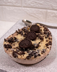 chocolate chip crispy oreo cookies on a easter egg and a spoon