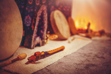 lamp with balls on woden stand and indian flute. © jozefklopacka