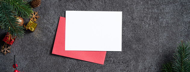 Christmas background design concept with fir tree branch border frame and blank card.