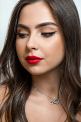 Perfect woman with red lips close up fashion portrait